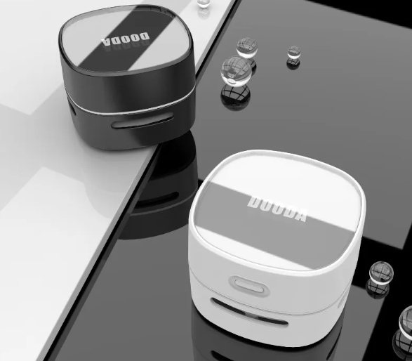 Tidy in white and black finishes on a glossy surface